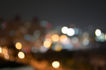 Abstract bokeh night garden in city background.Defocused city night filtered bokeh abstract...