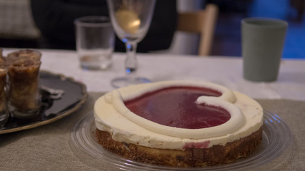 Isolated single white heart shaped cheese cake