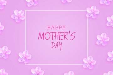 Happy Mother's Day lettering on a light pink background with beautiful spring flowers. Congratulatory background. Holiday card