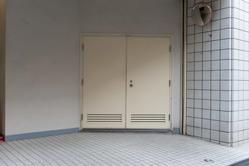 sidewalk by street wall & door