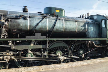 Naklejka premium Kouvola, Finland - April 18, 2019: Old steam train Ukko-Pekka on the station at morning.