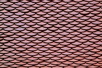 The roof tiles are used to measure Thailand.