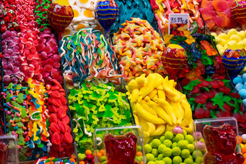 Various colorful candies and jellies in the marketplace