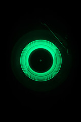 Concept of speed - Trail of fire and smoke - Vinyl record. Burning vinyl disk. Turntable vinyl record player. Retro audio equipment for disc jockey. Sound technology