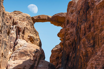 Burdah Rock Bridge in incredible lunar landscape in Wadi Rum in the Jordanian desert . Wadi Rum...