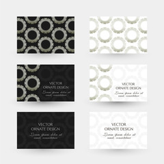 Silver circle ornament. Business cards with ornaments on the black and white background.