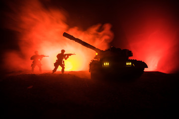 War Concept. Military silhouettes fighting scene on war fog sky background, World War German Tanks...