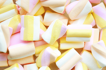 Background of pastel colours marshmallows