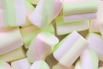 Texture of pink green white marshmallows