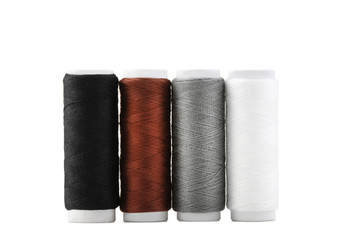 Colourful thread spools isolated on a white