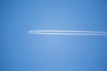 Airplane in the blue sky