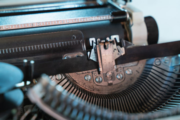 Abstract background with metal part and elements of typewriter