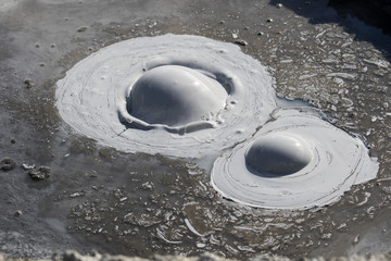 Iceland geothermal zone Namafjall - area in field of Hverir. Landscape which pools of boiling mud and hot springs. Tourist and natural attractions.