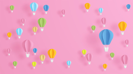 Illustration of hot air balloons on pink background in paper art design. paper cut and craft style. vector, illustration.