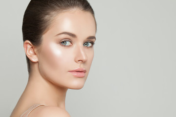 Naklejka premium Portrait of beautiful woman with clear skin. Skincare and facial treatment concept