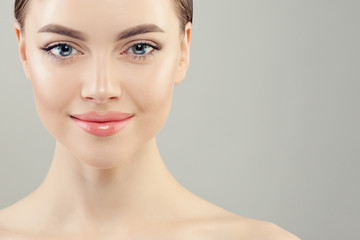 Closeup portrait of beautiful woman with clear skin