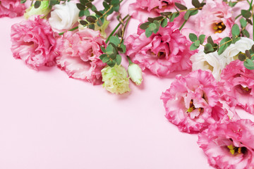 Mother day greeting card. Beautiful spring flowers on pink table.