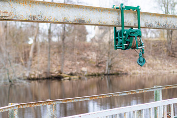 Old electroplate damper on the dam, bridge near the reservoir
