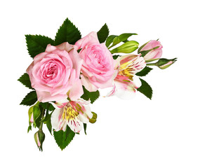 Pink roses and alstroemeria flowers with green leaves in a corner arrangement
