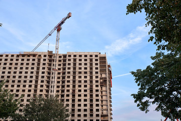 Construction of residential buildings of new neighborhoods. the process of building a multi-storey residential building