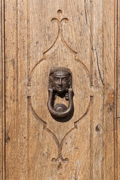 Wooden door with Sphinx-knockers, Pitigliano, Maremma, district Grosseto, Tuscany, Italy, Europe