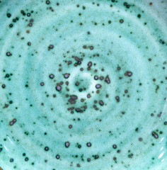 Background of old pottery with molds of mint 