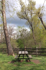 Picnic Table and Dark Clouds