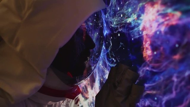 Astronaut exploring the space from his capsule