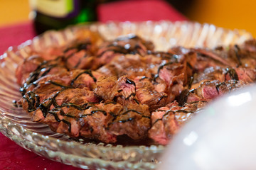 Beef steak cooking. Rib eye steak. Raw meat. Juicy marbled meat on BBQ grill. Medium rare meat roasting