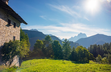 Fototapeta na wymiar Traditional stone Houses in Italian Dolomites Popular touristic attraction, Village Ronch, Italy