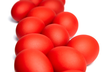 Red Easter eggs isolated on white background. Christian holiday traditions. Traditional symbol
