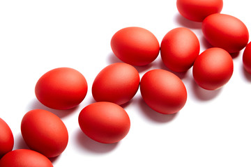 Red Easter eggs isolated on white background. Christian holiday traditions. Traditional symbol
