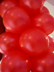 red interconnected balloons