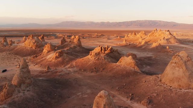 Aerial Shot of Rock Spires And Sunset Silhouettes in Desert