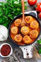 Meatballs in creamy tomato sauce