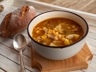 Delicious pea soup with rye croutons