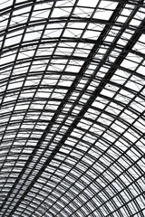 Perspective view to semispherical ceiling of glass and metal in modern building as background, texture (vertical image orientation)