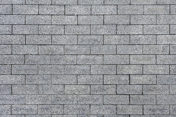 View on a gray stone brickwork as texture, background