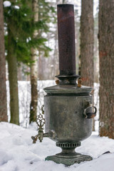 Samovar in the forest.