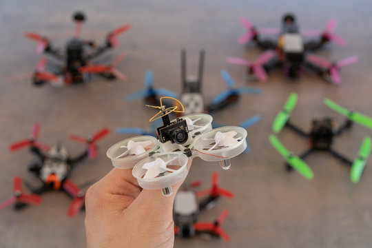 Tiny Whoop, FPV drone for indoor racing - Powered by Adobe