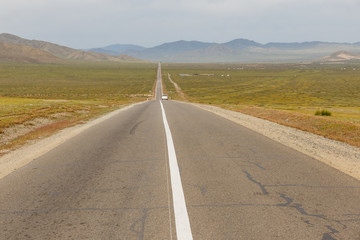 Asphalt road Sukhe Bator - Darkhan in Mongolia, beautiful landscape, Mongolia