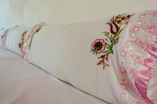 Traditional Turkish handmade colorful natural fabric pillows. Decorative floral embroidery pattern, ornament for clothing decor. Bohemian handmade style decoration design. Turkish butha.