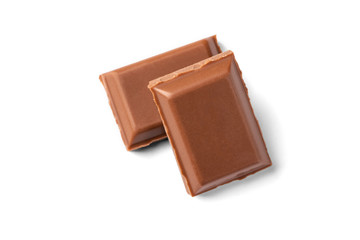 Two slices of milk chocolate.