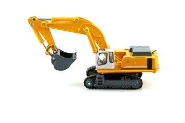 Yellow excavator model toy isolated on white background.