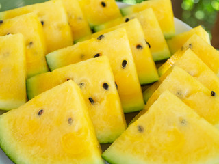 Close-up of yellow watermelon slices, summer freshness