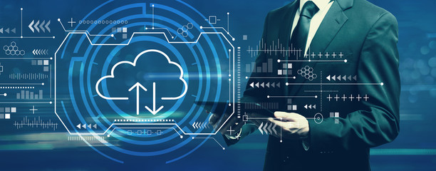 Cloud computing with businessman holding a tablet computer