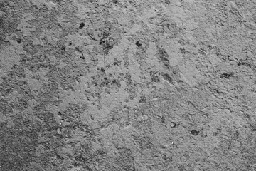 Wall fragment with scratches and cracks