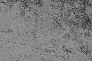 Wall fragment with scratches and cracks