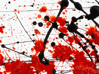 Dripping black and red paint Flowing fuel oil splashes, drops and trail.