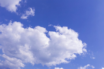 Blue sky and white clouds, rain clouds on sunny summer or spring day.